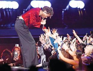 Harry Styles sweeps board at Brit Awards