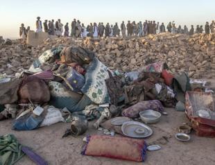 People dig out dead, injured from Afghanistan earthquakes that killed at least 2,000