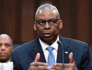 US, China defense chiefs hold first talks in nearly 18 months