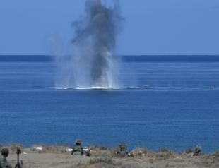 US, Philippine troops sink China-made vessel in war games