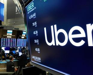 Uber says expanding shuttles in US, other services
