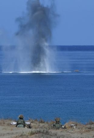 US, Philippine troops sink China-made vessel in war games