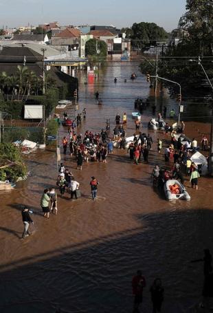 Floods misery reminder of climates role in supercharging rain