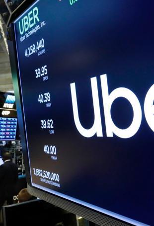 Uber says expanding shuttles in US, other services