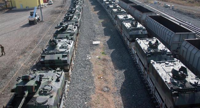 Turkey sends more troops, tanks on Syria border