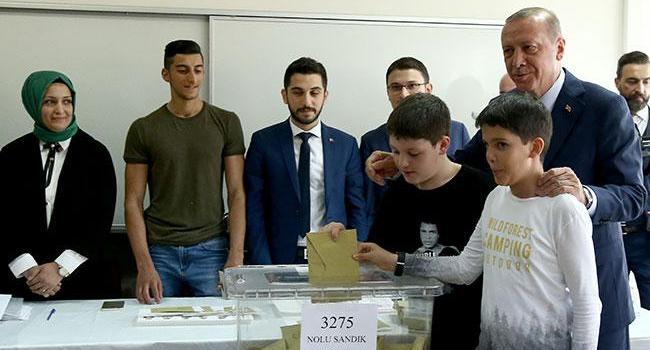 Political leaders cast votes in Turkey’s landmark twin elections