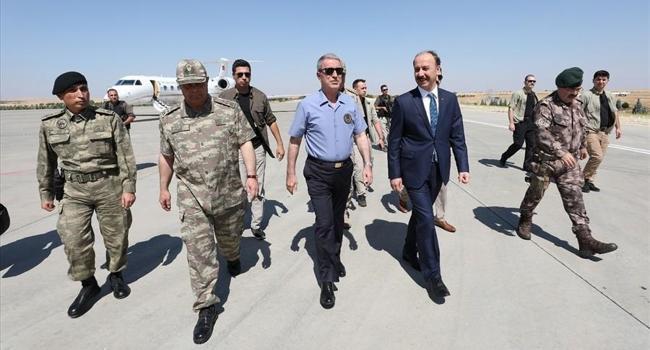 Turkish defense minister on border for Syria safe zone