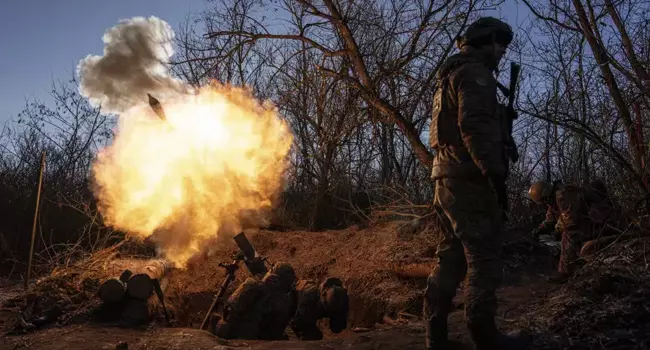 Battle rages in Ukraine town; Russia shakes up its military