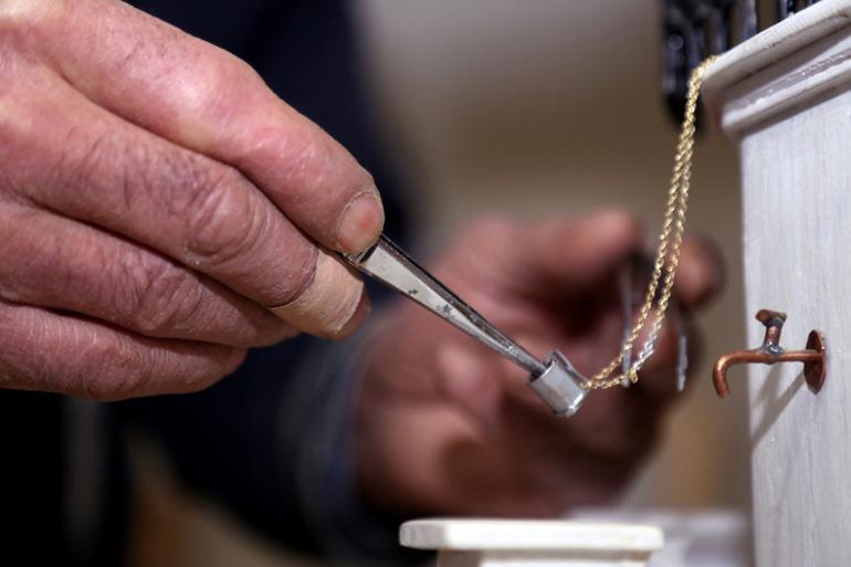 Local man turns wood into models of Aegean city’s historical spots