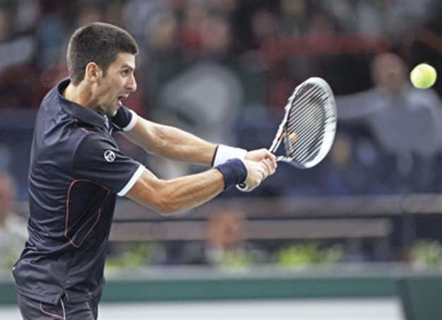 Djokovic reaches quarterfinals
