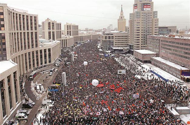 Putin defiant after new mass rally rocks Russia