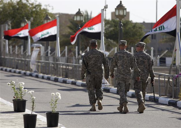 US hands key base over to Iraqi control