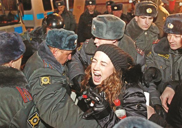 Putin vows to end police repression