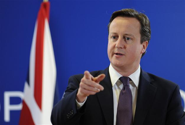 UK threatens eurozone, stays out of treaty