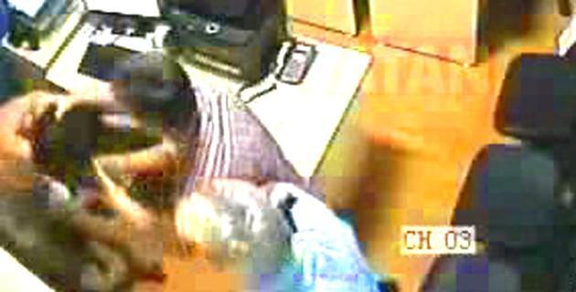 Woman handcuffed, beaten at police station