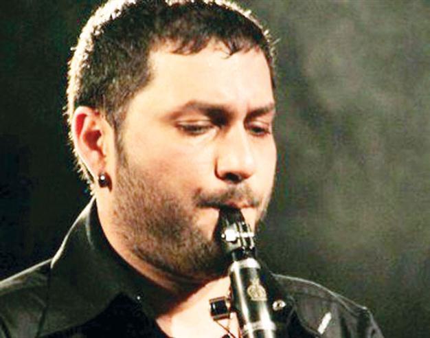 HÜSNÜ ŞENLENDİRİCİ