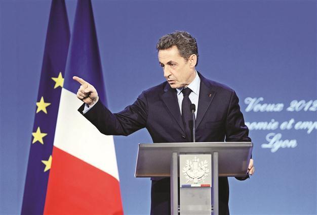 Sarkozy warns against intervention on Iran