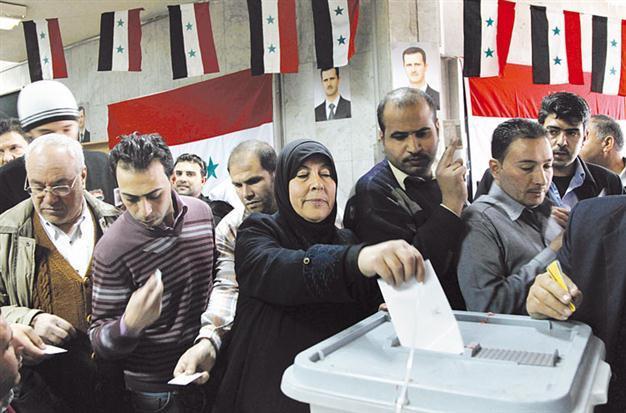 Fresh violence clouds Syria voting for new constitution