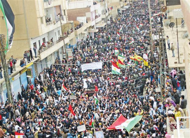 Al-Assad sets general elections for May 7