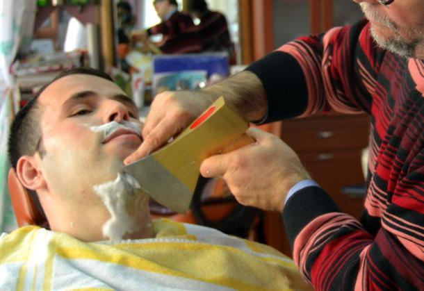 Turkish barber uses fire and ax to shave customers