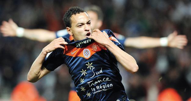 Montpellier wins with late goal to keep lead