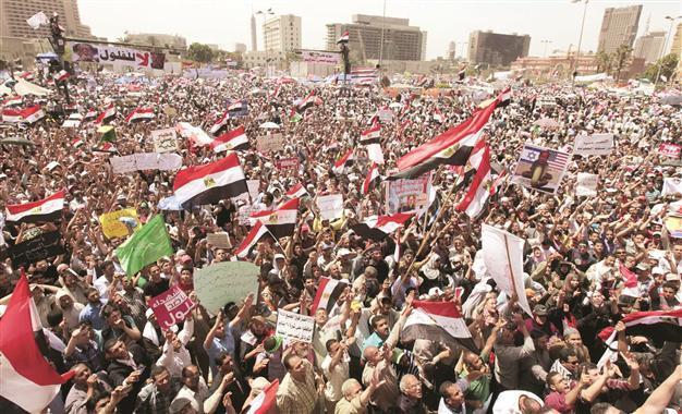 Thousands protest against Egypt army