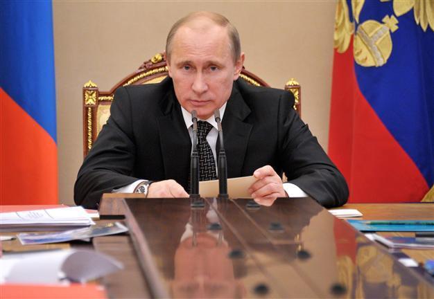 Putin visits Berlin, Paris amid divide over Syria