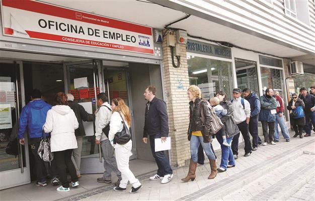 Downgrade hits Spain in crisis