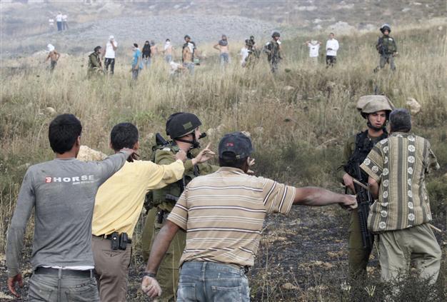 Israel army opens probe over settler shooting video
