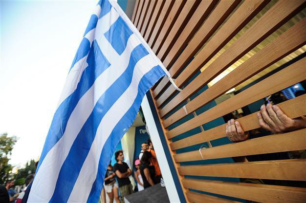 Greece clinches coalition deal to revise bailout