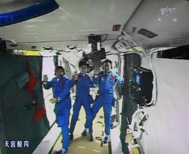 Chinese astronauts parachute land after mission