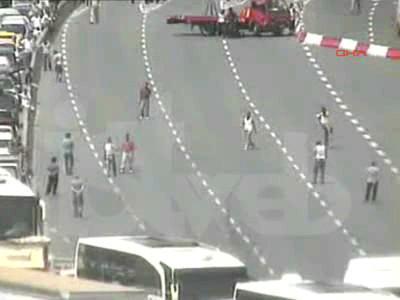 Drivers stranded in traffic play football on Istanbul bridge