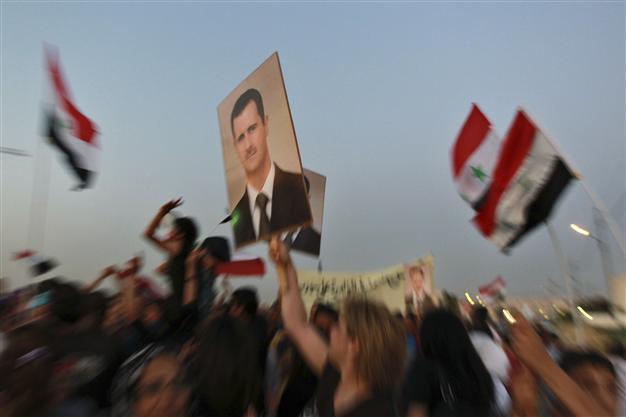 Syria denies claims of Assad exit
