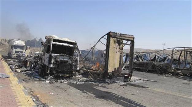 Turkish truck drivers accuse rebels of looting