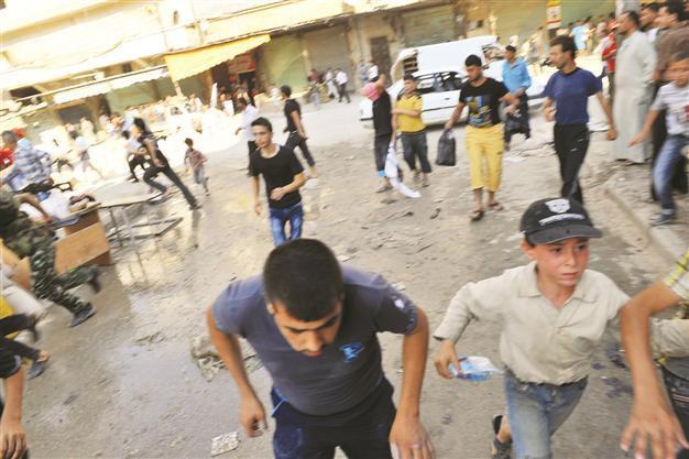 Syria army reinforces, Russia lashes out to US