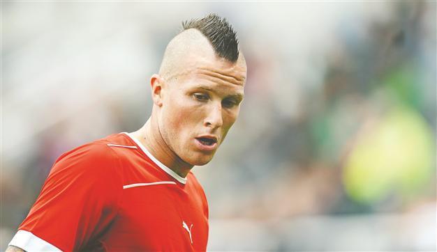 Swiss player Morganella sent home for racist tweet