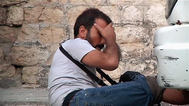 Photos illustrate shooting of Turkish reporter in Syria