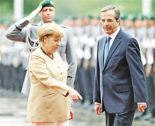 Angela Merkel gives Greece euro hope, but no extra time