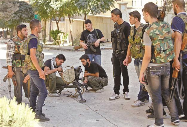 Dozens dead in raid on Syria fuel station