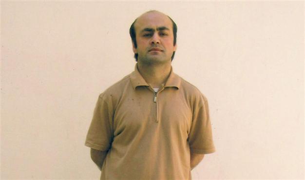 Three guards sentenced to life in prison on torture charges