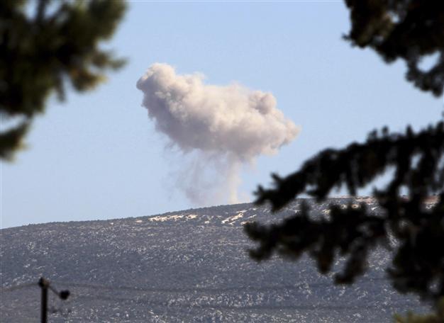 Turkey fires back after Syrian shell hits: report
