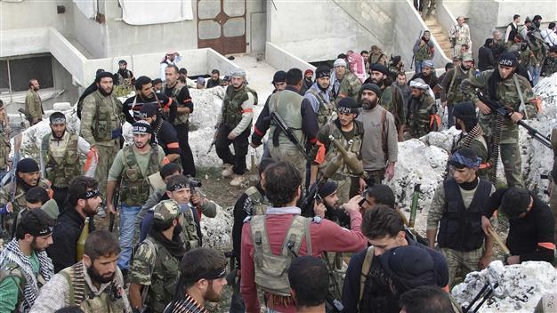 UK backs safe exit for Assad as violence rises