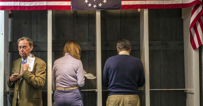 Obama secures second term, makes history again