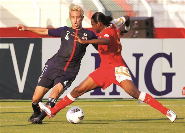 Japan defeats Oman to close in on World Cup