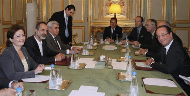 Syrian opposition leaders meet French president