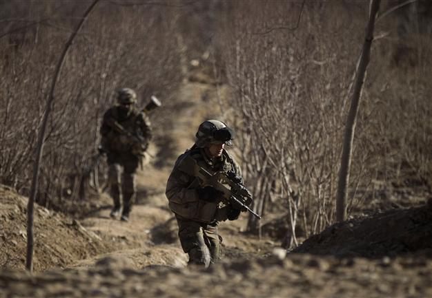 Afghan revenge attack kills three, wounds 90