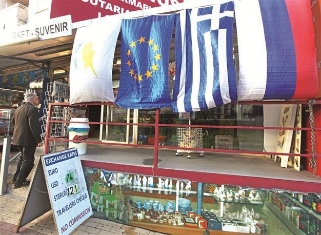 Bailout deal approved, Greek Cypriots claim