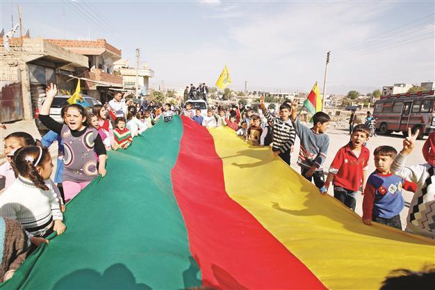 Kurdish factions unite against Syrian rebels