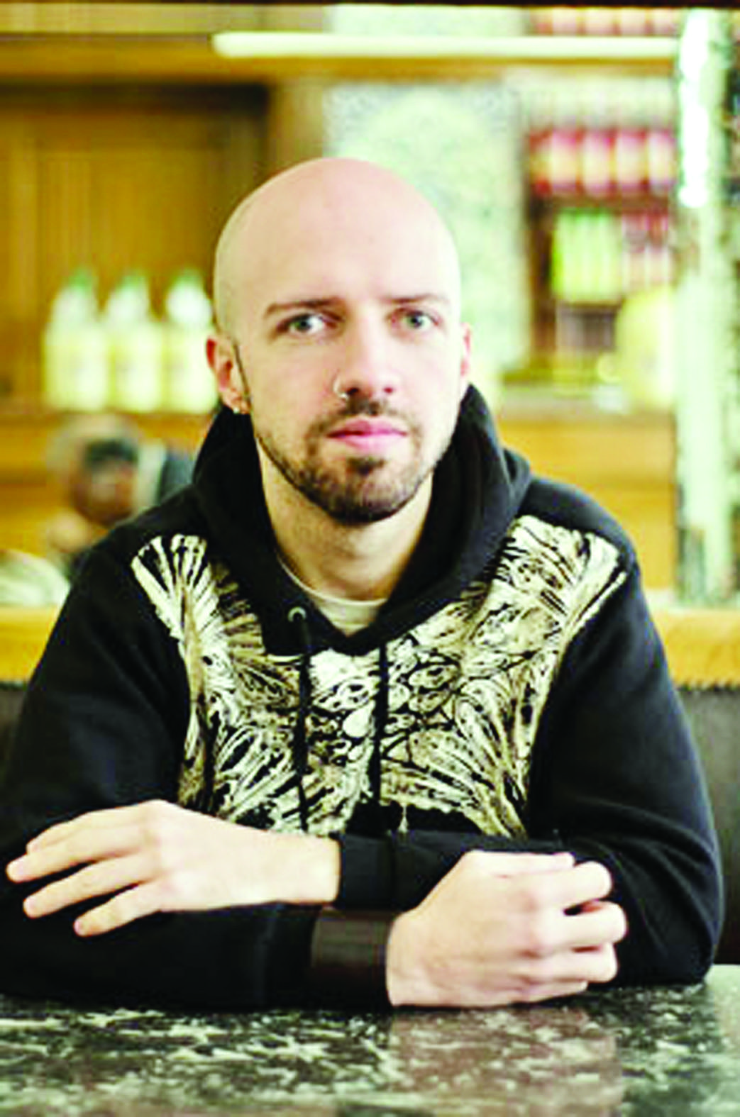 Artist scratches beneath the surface with seed and bullet