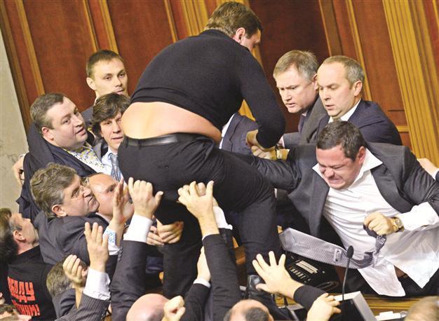 Ukraine Parliament erupts in brawl as PM re-appointed